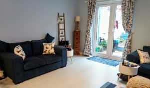 44081553 1855710331221414 8395784125847437312 n 300x176 - 411632 Simone carer living room area