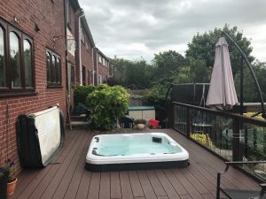 rear house hot tub 300x225 - Hot tub of SLSW carers Lynn and Mike