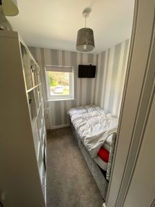 single bedroom 225x300 - Single bedroom of SLSW carers Lynn and Mike