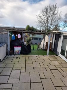 sue back door 225x300 - Back Yard - Shared Lives South West Carer Sue