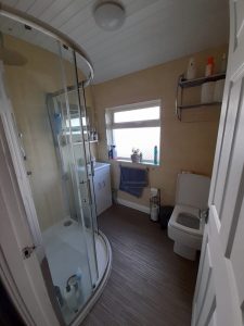 sue shower room 225x300 - Shower Room - Shared Lives South West Carer Sue